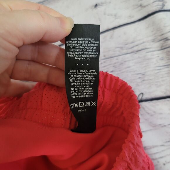 NWT Woman’s SPYDER Running Shorts Coral Reflective Seams Size Small - Picture 7 of 7